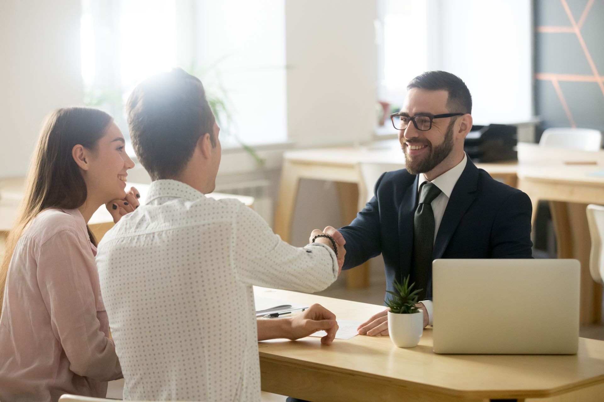 a couple meeting with a financial planner