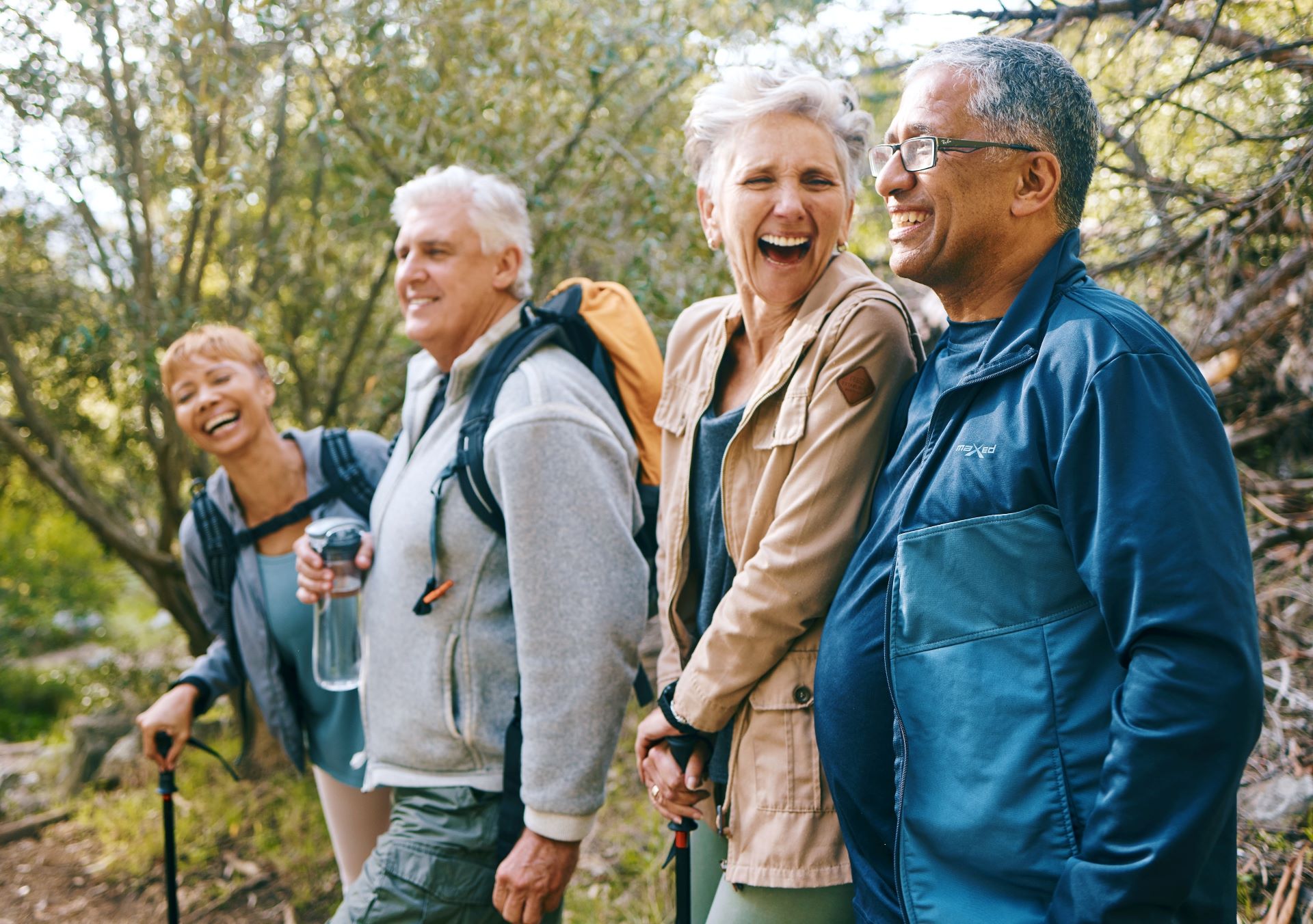 a group of friends hiking and laughing together