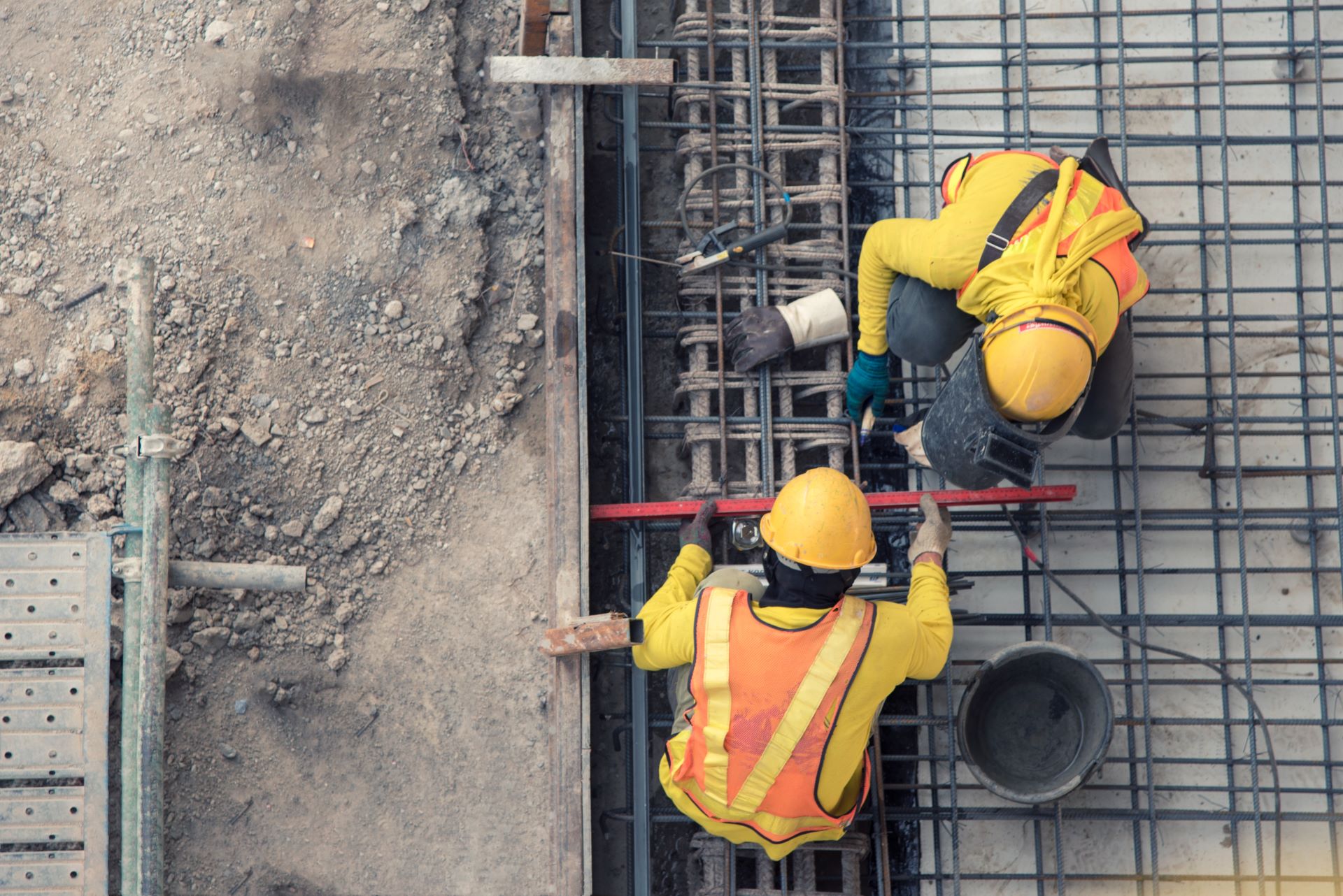 an aerial view of construction workers